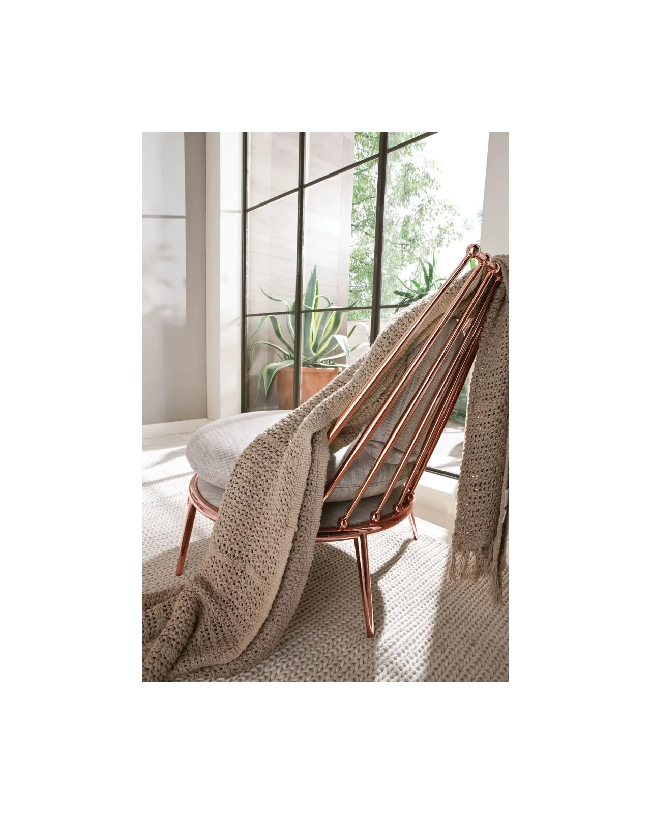 Aurora iron back armchair by Cantori, in an interior setting, photo 5 of 8