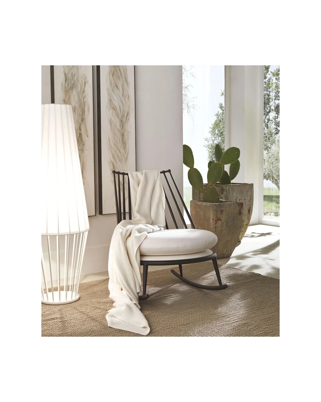 Aurora iron back rocking chair by Cantori, in an interior setting, photo 3 of 6