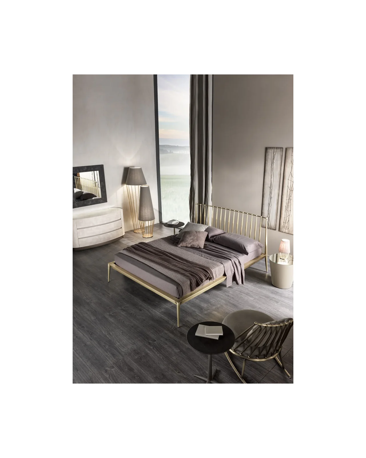 Bedroom with a slim metal bed and a metal rocking armchair, designer furniture from Italy