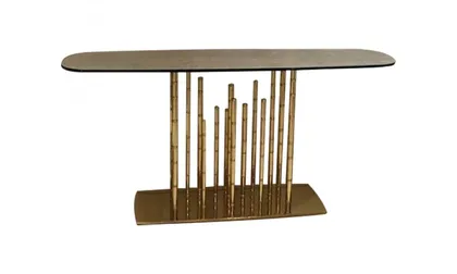 Elegante consolle Lotus II con lussuosa finitura oro lucido, per un ingresso moderno.