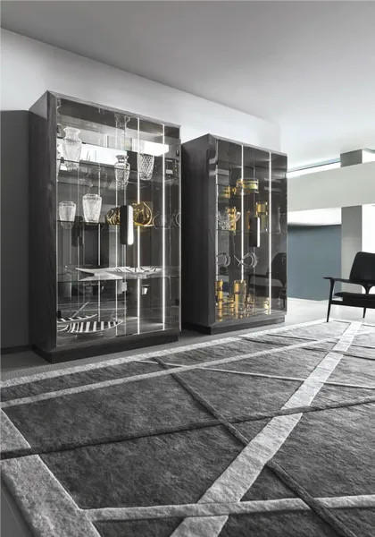 Sculptural living room set with dark tones and marble from the Giorgio Collection Mirage line.